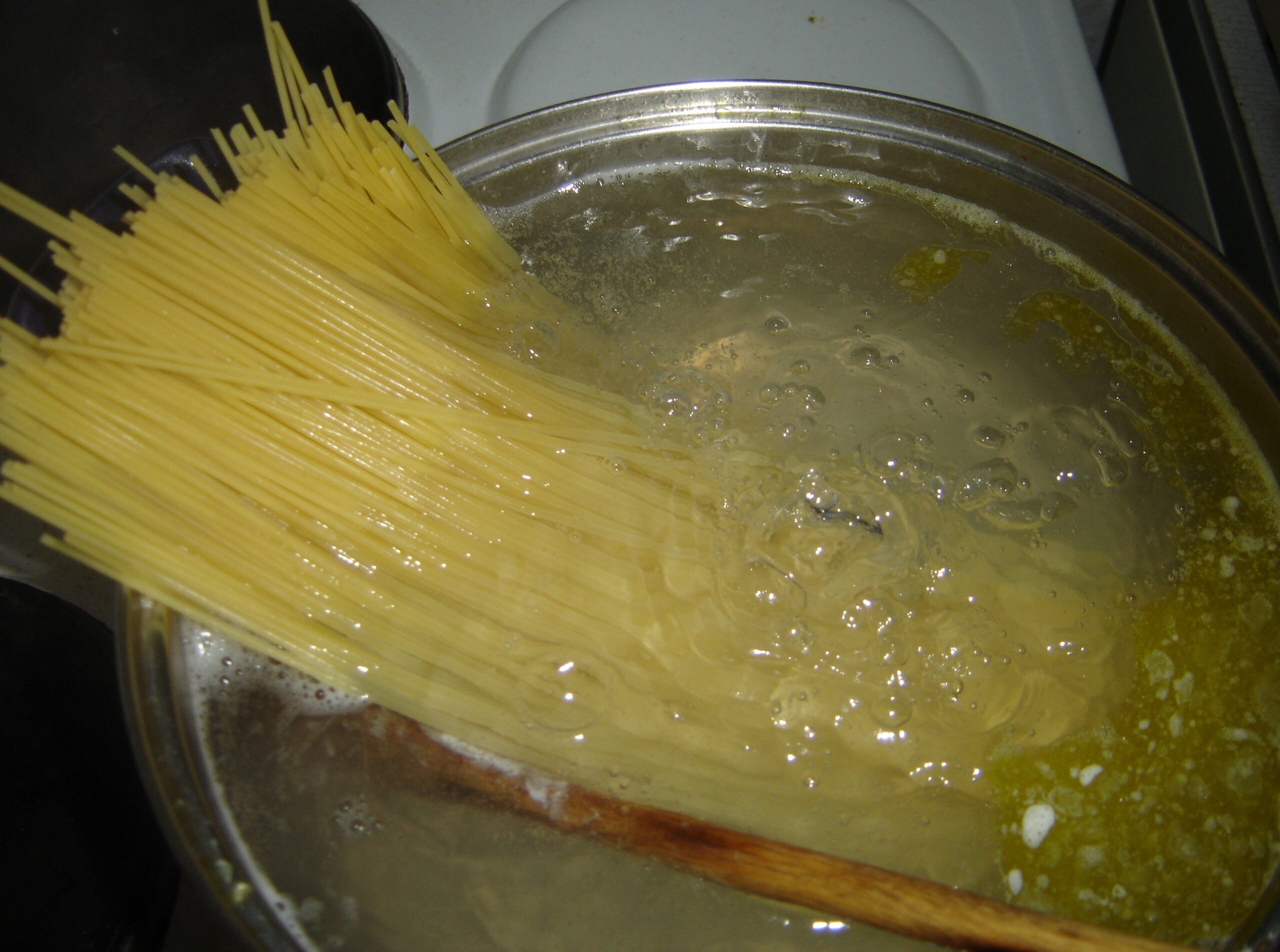 Chef preparing dish at Al Dente Italian Restaurants in Dubai
