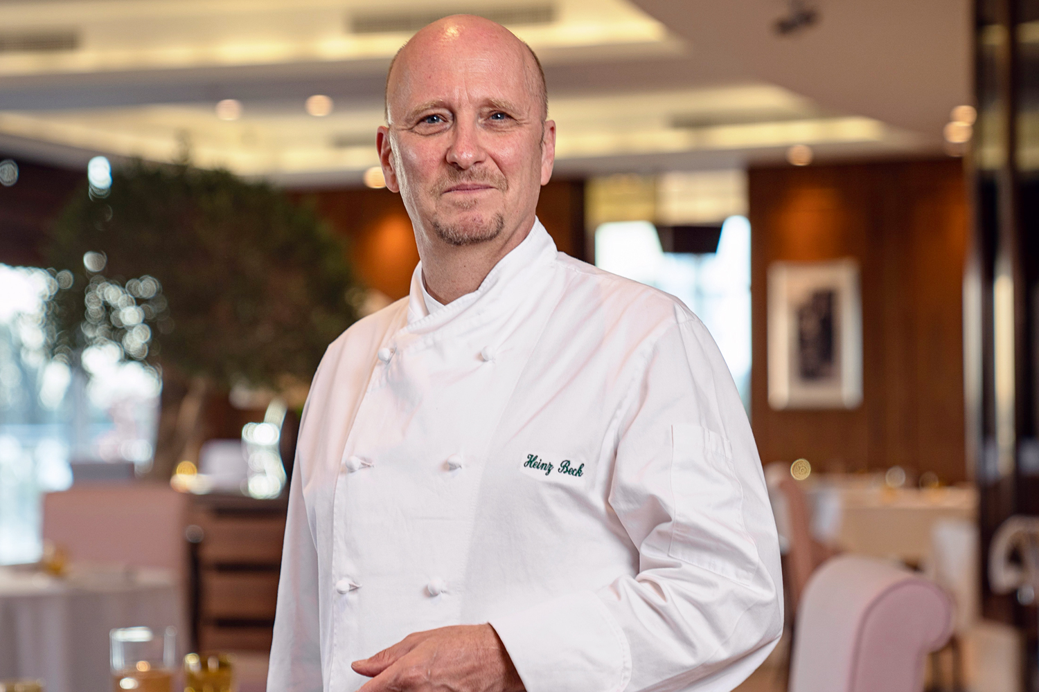 Chef Heinz Beck preparing a dish Italian Restaurants in Dubai