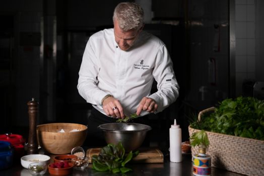 Chef Preparing Dish Splendido Restaurants in Dubai